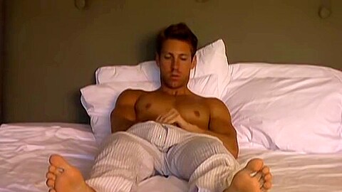 Horny Michael shows off his soft feet while jerking off