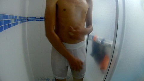 Horny young man jerks off three times in his underwear under the shower