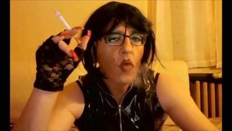 Lana smokes 100's in PVC while showing off her crimson screws